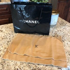 Authentic Chanel shopping bag and authentic Louis Vuitton dust cover.